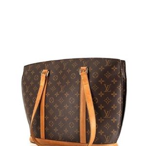 Louis Vuitton excellent condition Babylon bag receipt is in bag